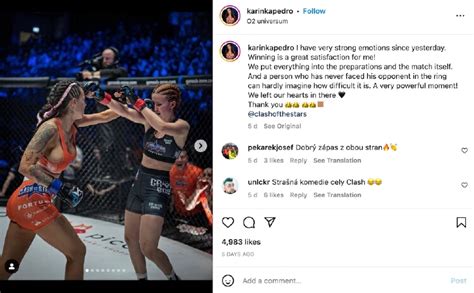 Two MMA fighters surprise crowd as they kiss during。